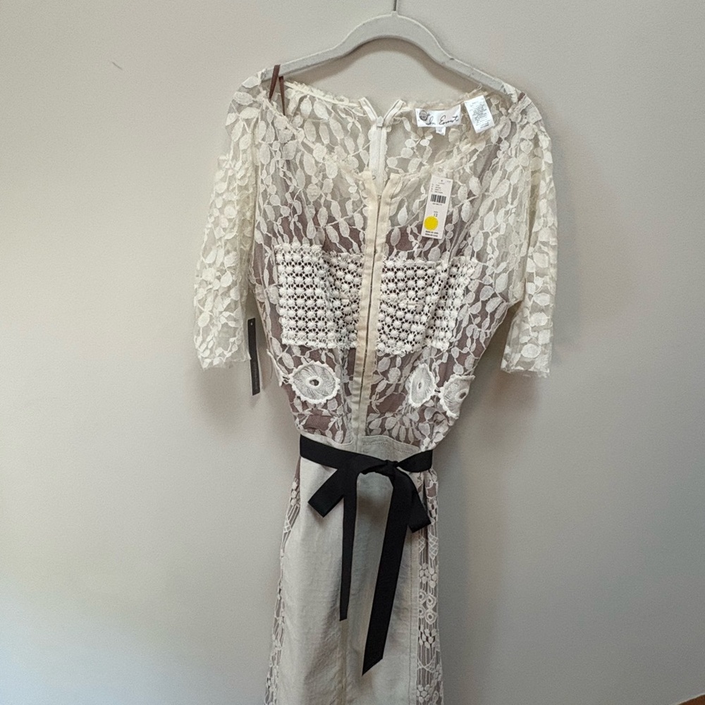 Elegant Lace Dress with Black Bow